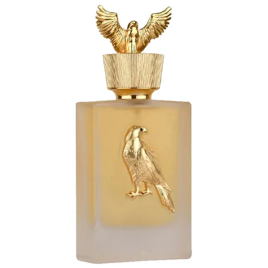 Decorative empty glass bottle with golden eagle design, home decor accent piece