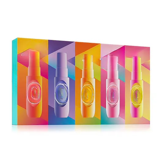 Empty decorative glass bottles with colorful caps, ideal for home decor or DIY projects
