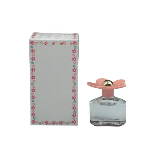 Empty decorative glass bottle with pink flower cap, floral box packaging, home decor accent