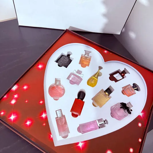 Empty decorative glass bottles in heart-shaped display, perfect for home decor and gifting