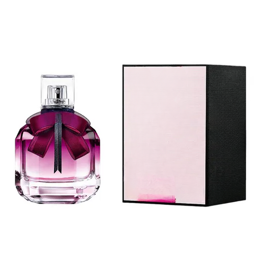 Empty decorative glass bottle with purple bow, ideal for home decor, no liquid inside
