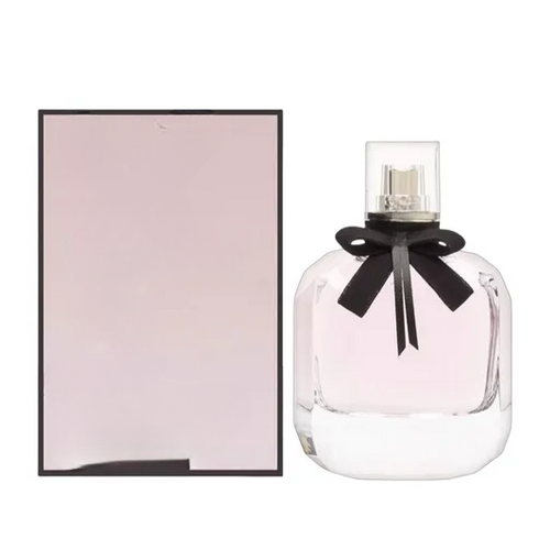 Decorative empty glass perfume bottles with bows, ideal for home decor and styling