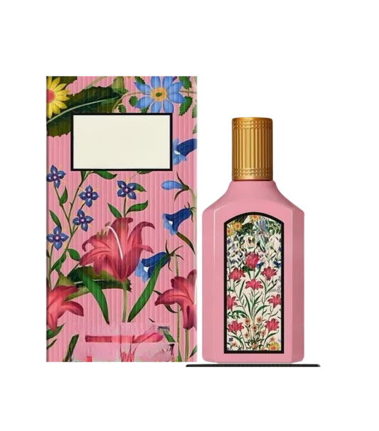 Empty decorative pink floral bottle with gold cap, ideal for home decor