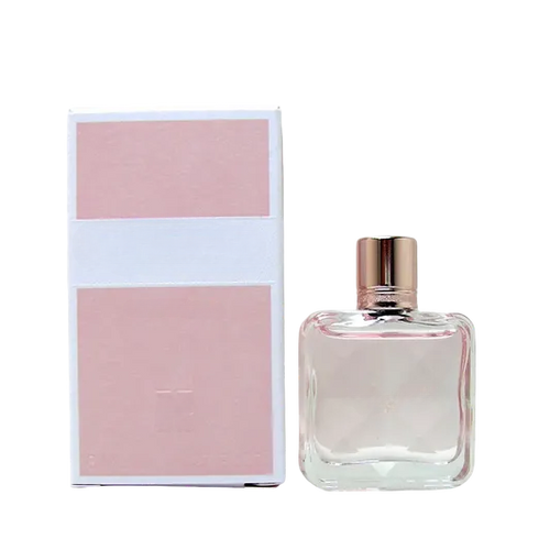 Empty decorative glass bottle with rose gold cap, ideal for home decor, no liquid inside