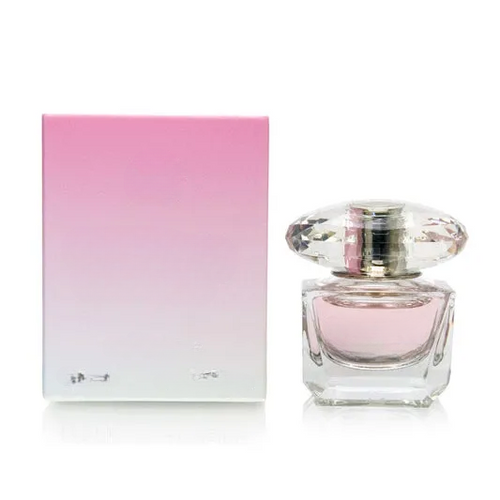 Empty decorative glass bottle with pink gradient box, home decor accent