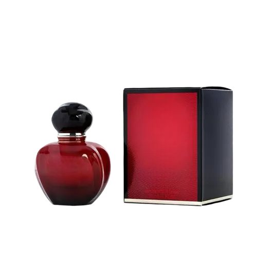 Empty decorative red glass bottle with black cap, stylish home decor accent