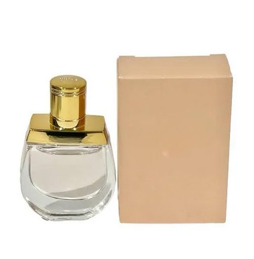 Empty decorative glass bottle with gold cap, ideal for home decor, no liquid included