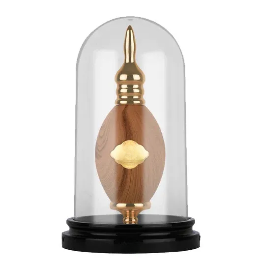 Decorative wooden vase with gold accents under glass dome, empty home decor piece