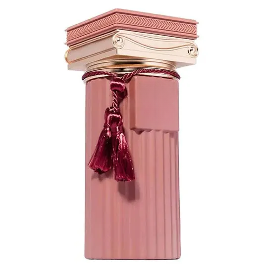 Pink decorative column vase with gold trim and burgundy tassels, empty home decor accent piece