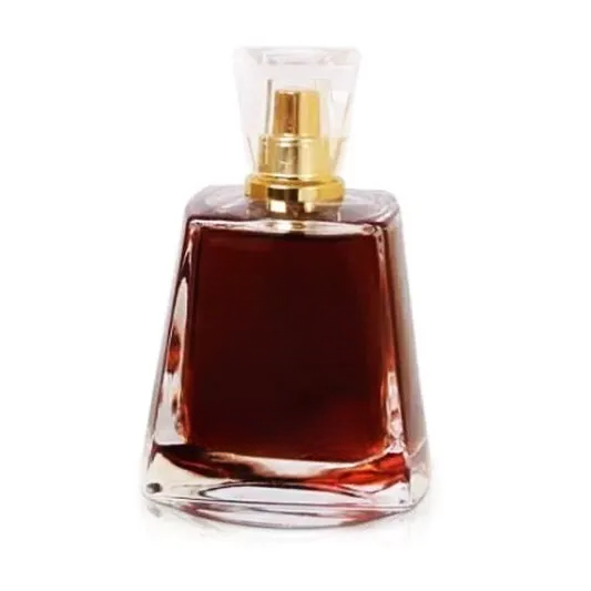 Empty decorative glass bottle with gold spray pump, perfect for home decor